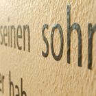 Schrift auf Wand