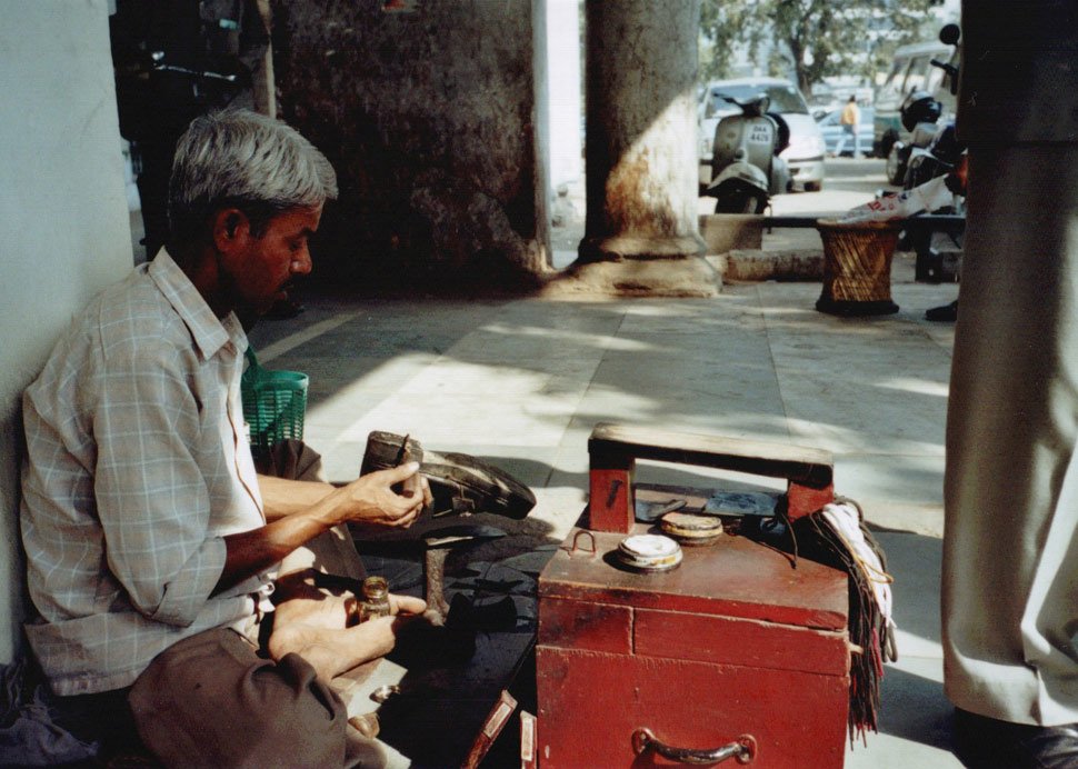 Schuhputzer am Connaught Place, Delhi