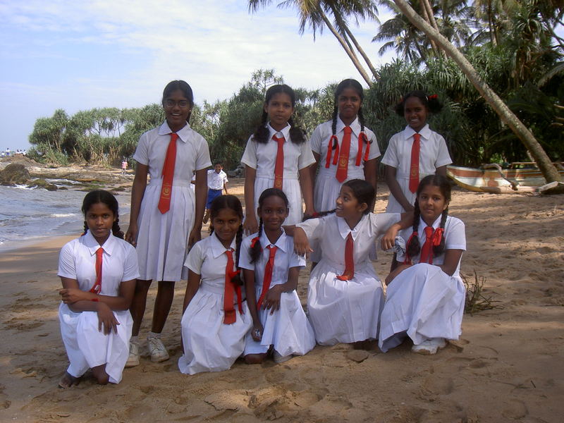 Schulklasse am Palmenstrand