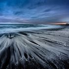 Schwarzer Strand am Jökulsárlón