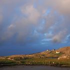 Schwebend auf einer Insel in den Wolken