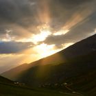 Schweiz: Morgensonne contra Wolken