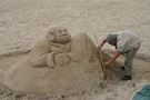 Sculpteur sur sable de photoman 