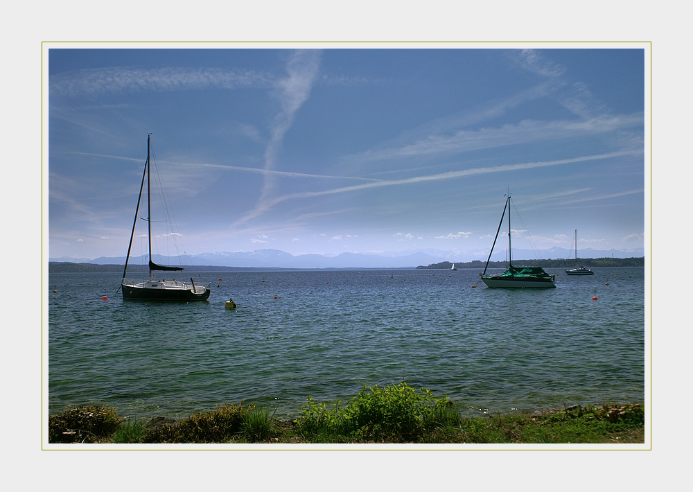 Seeblick mit Alpen