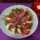 Selfmade tomatoe-, mozarella-. basilic- and hamsalad