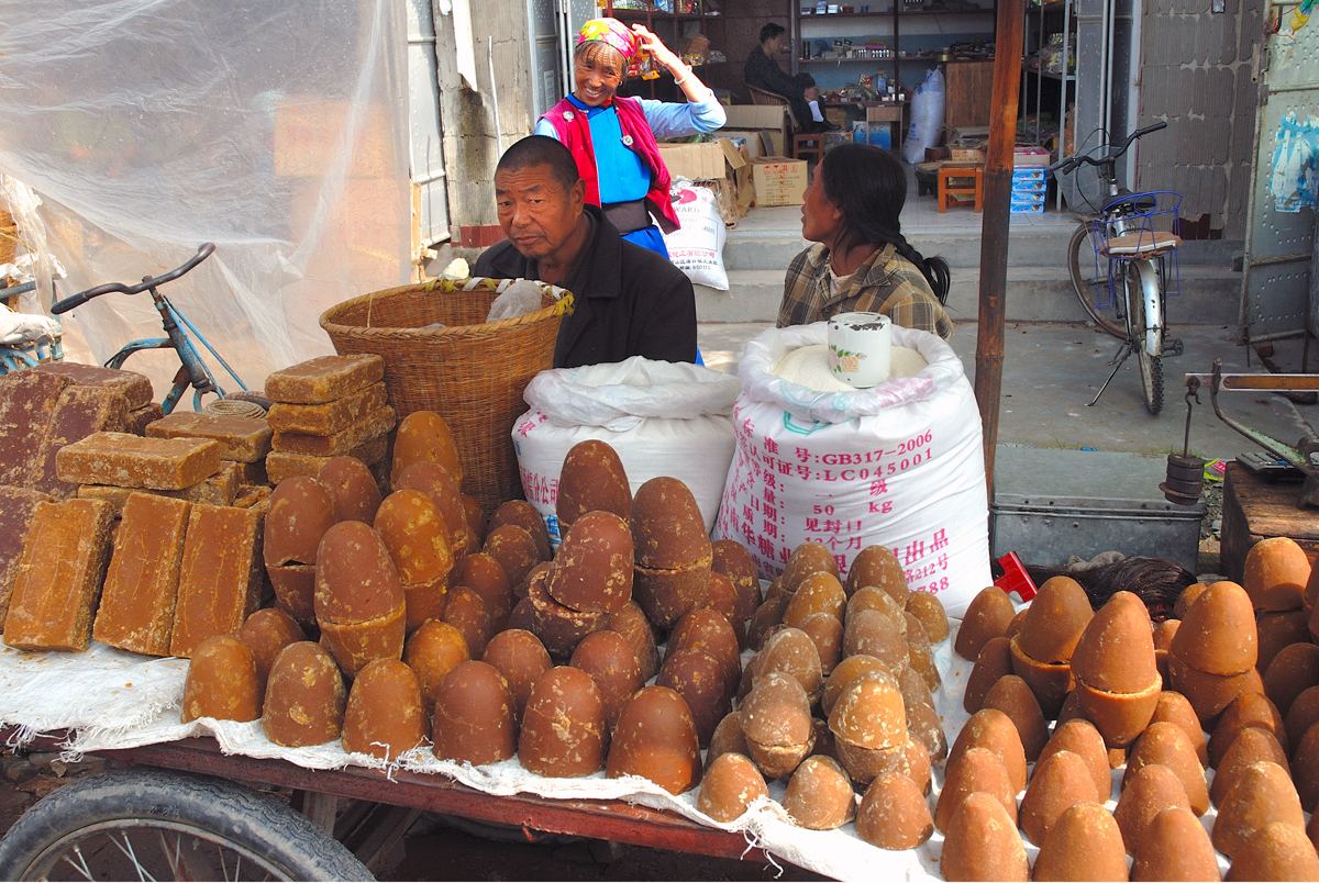 Selling palm sugar at the Xizhou market