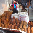 Selling palm sugar at the Xizhou market