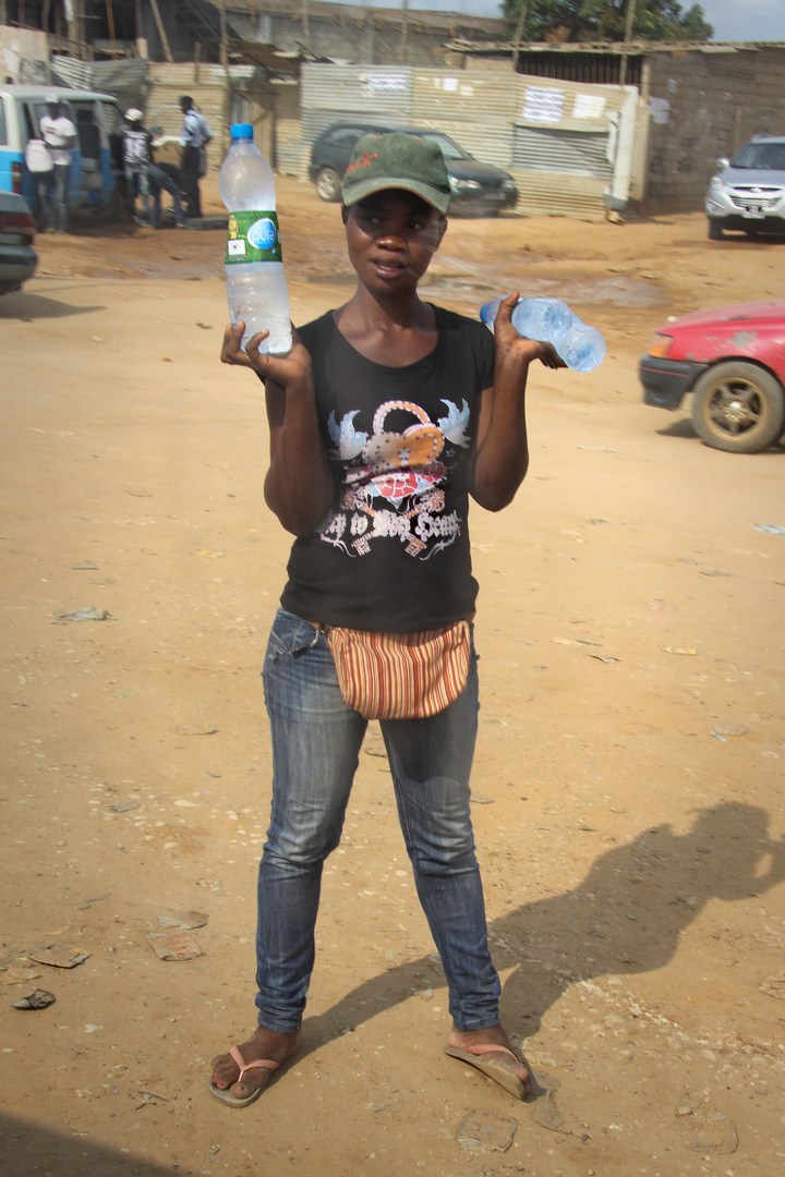 Selling water by the road, Angola, Luanda, December 2012