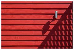 shadows on red wall