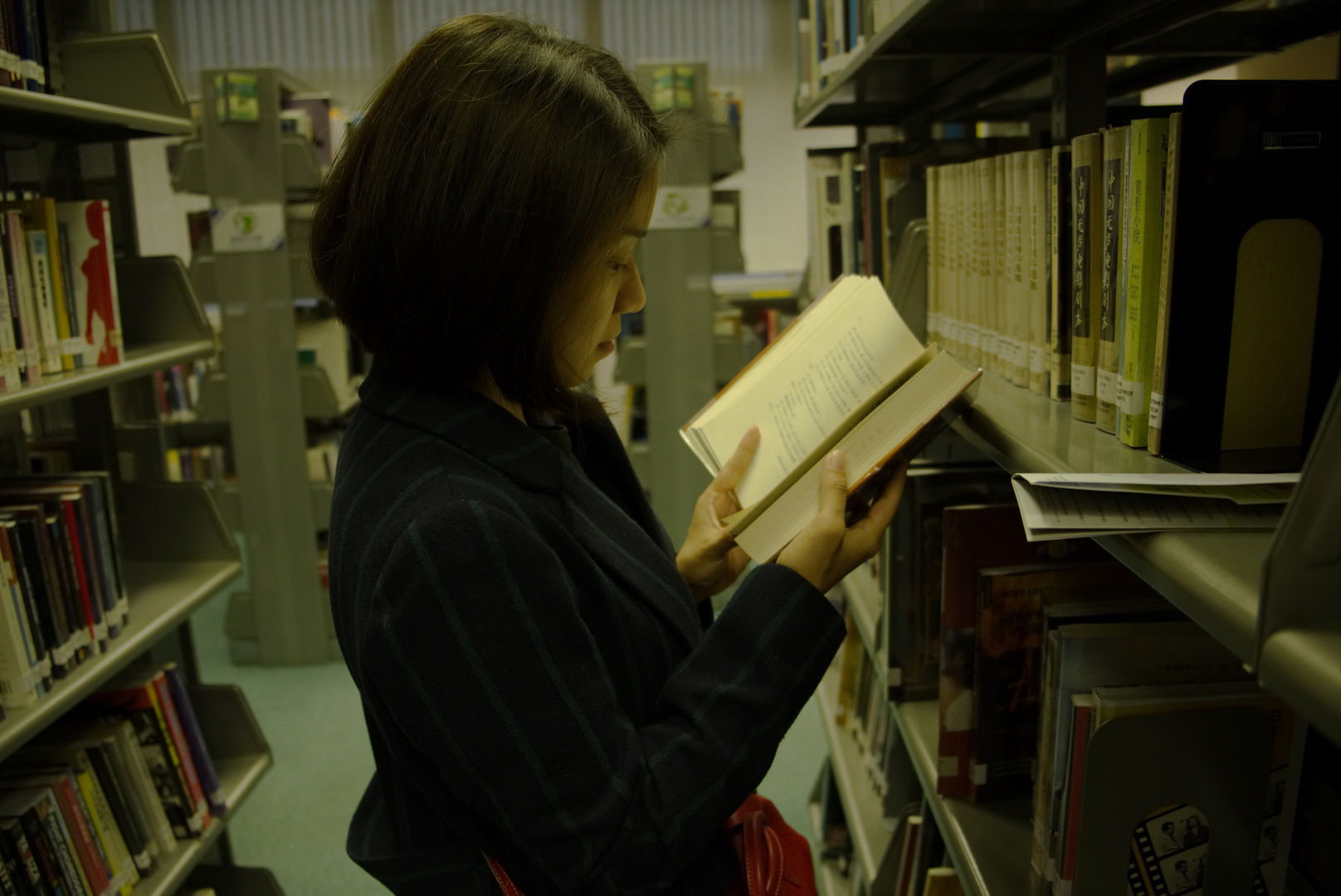 She is reading a book @HONGKONG