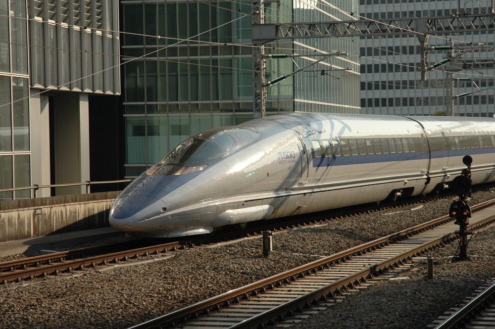 Shinkansen 500 series bullet train approaching Tokyo station