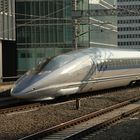 Shinkansen 500 series bullet train approaching Tokyo station