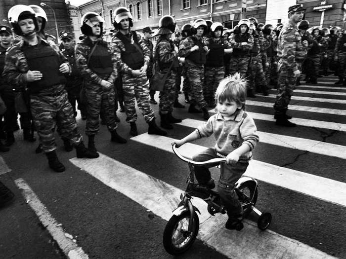 Shot with a small row of cyclist against riot police on the bridge of the Great Ordynka. 06/05/2012