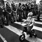 Shot with a small row of cyclist against riot police on the bridge of the Great Ordynka. 06/05/2012