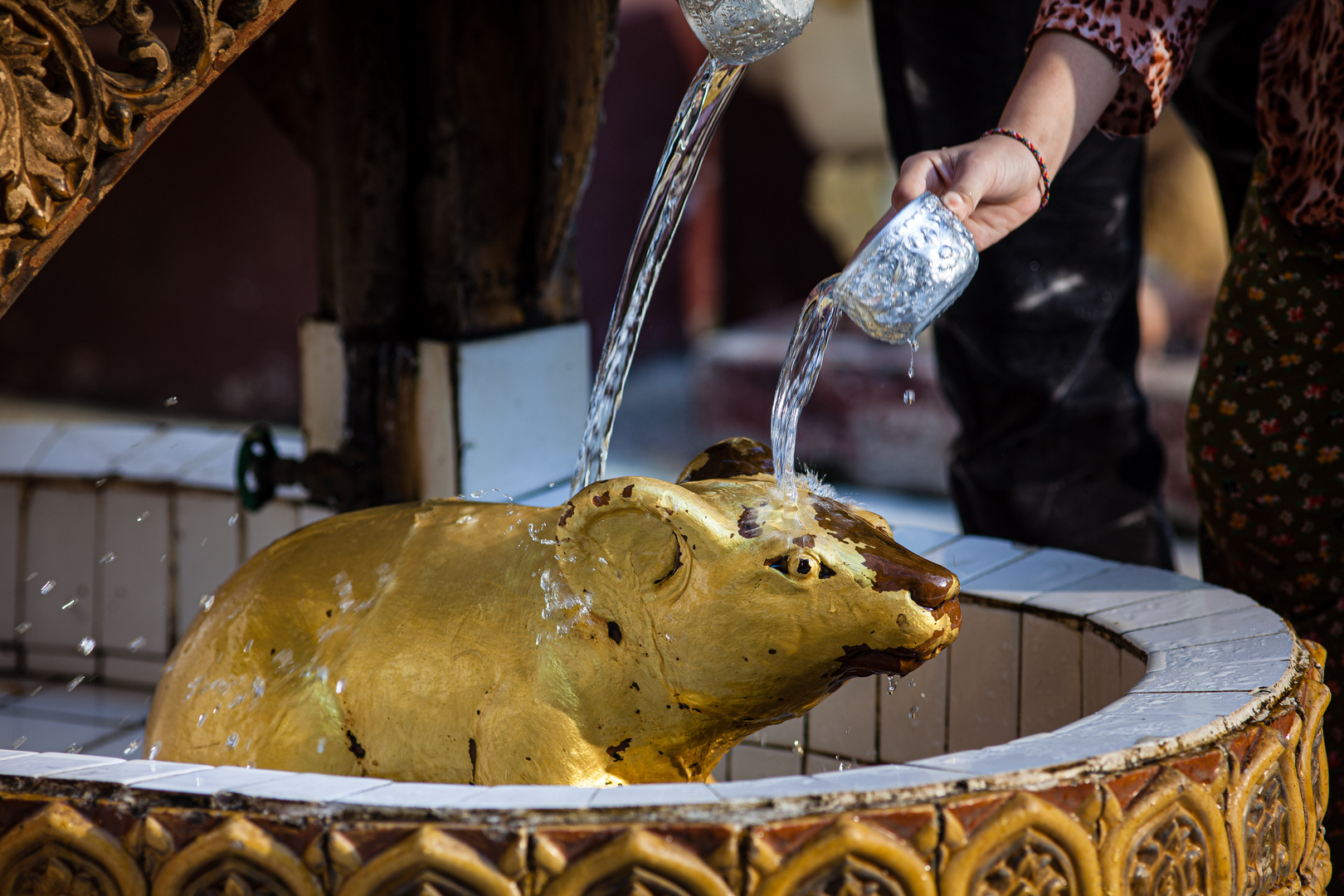 Shwedagon Pagoda - pouring water