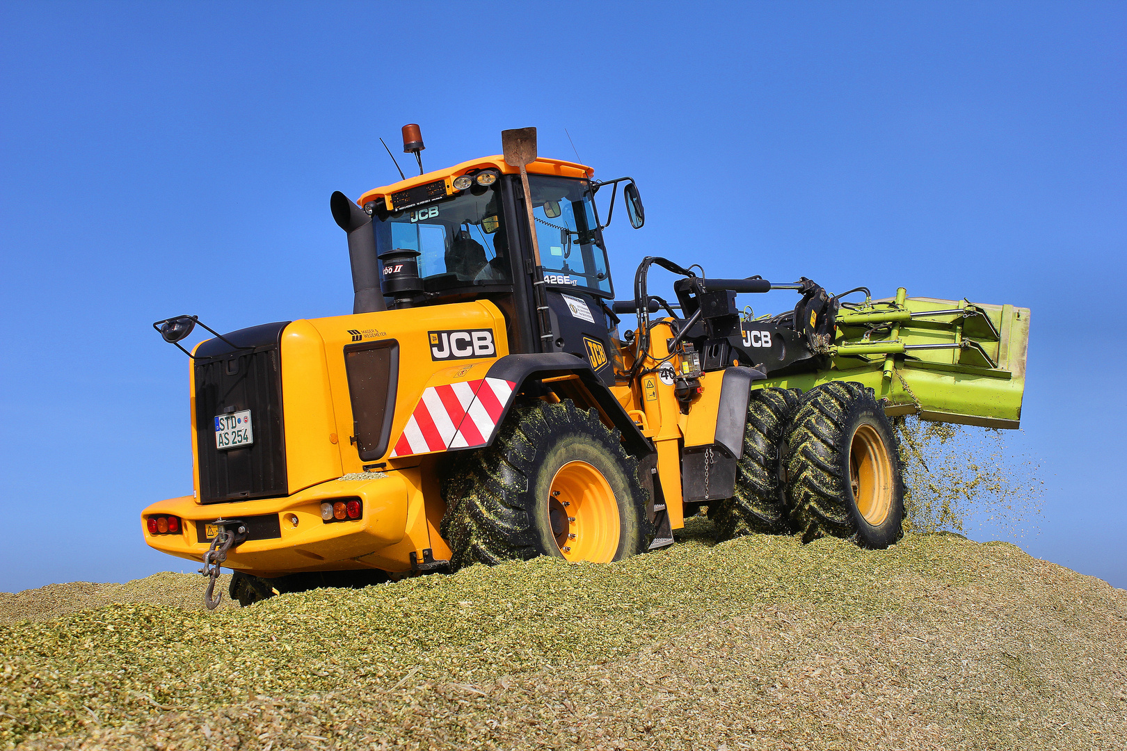 Silo Verdichten mit JCB Radlader