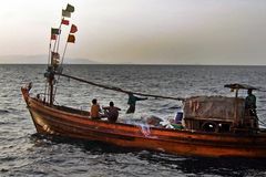 Simple fishing vessel in Burmese waters