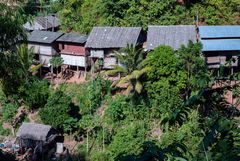 Simple huts at the hill slope