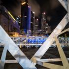 Singapore at night Skyline through Anderson Bridge