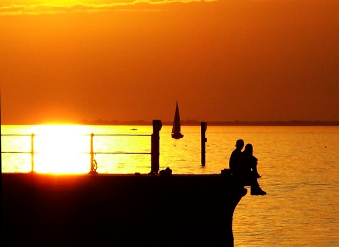 sitting at the dock of the bay