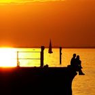 sitting at the dock of the bay