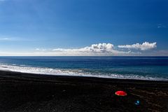 sitting at the lava beach