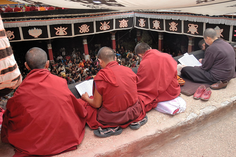 Sitting on the sill looking down into the Jokhang temple yard