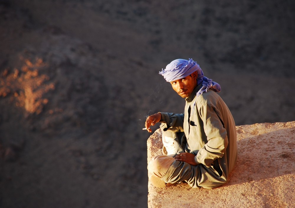 sitting on the top by hannes cmarits 