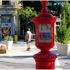 Skateboarder and Callbox - A Williamsburg Moment