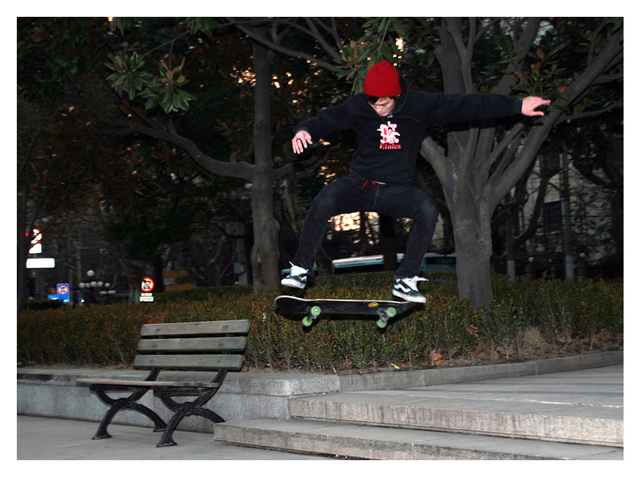 Skateboarder im Xujiahui Park Shanghai