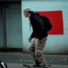 Skater in front of red