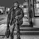 Skid Row Man Covering his Heritage