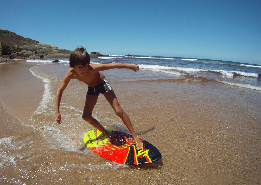 Skimboarder