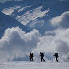 Skitourengänger mit Wolken