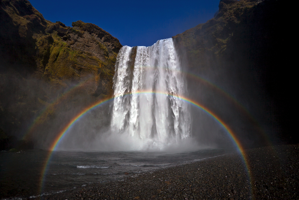 Skógafoss mit doppeltem Regenbogen von Dieter Sc. 