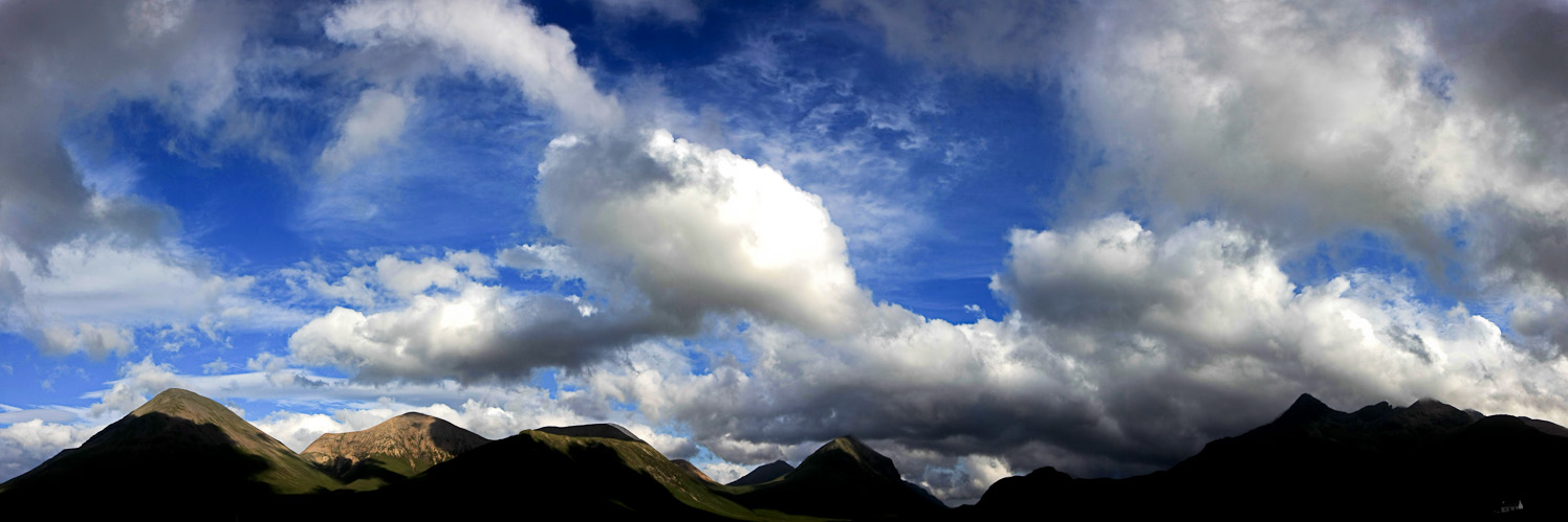 Skye, Mountains and a white cottage