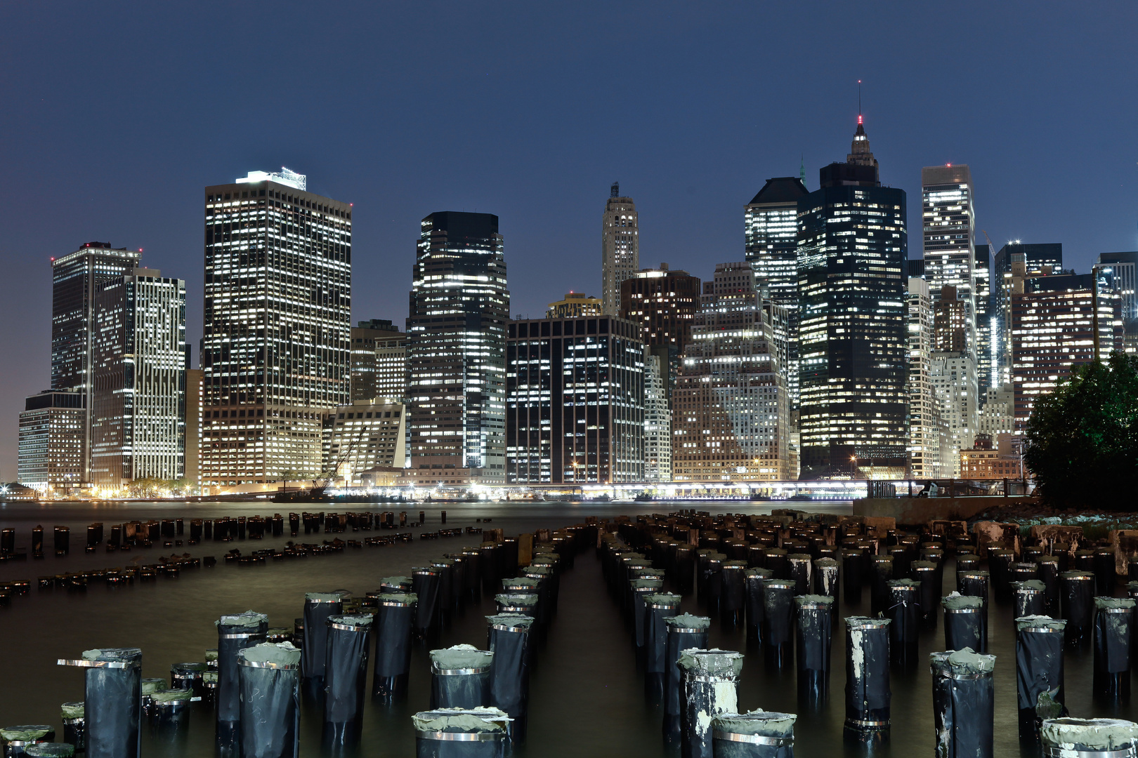 Skyline of New York from Brooklyn Bridge Park Pier 1 by Night