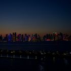 Skyline von Doha am Abend