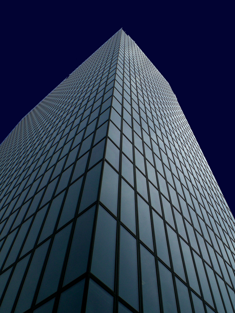 Skyscraper facade, gently lit in blue   - '6'