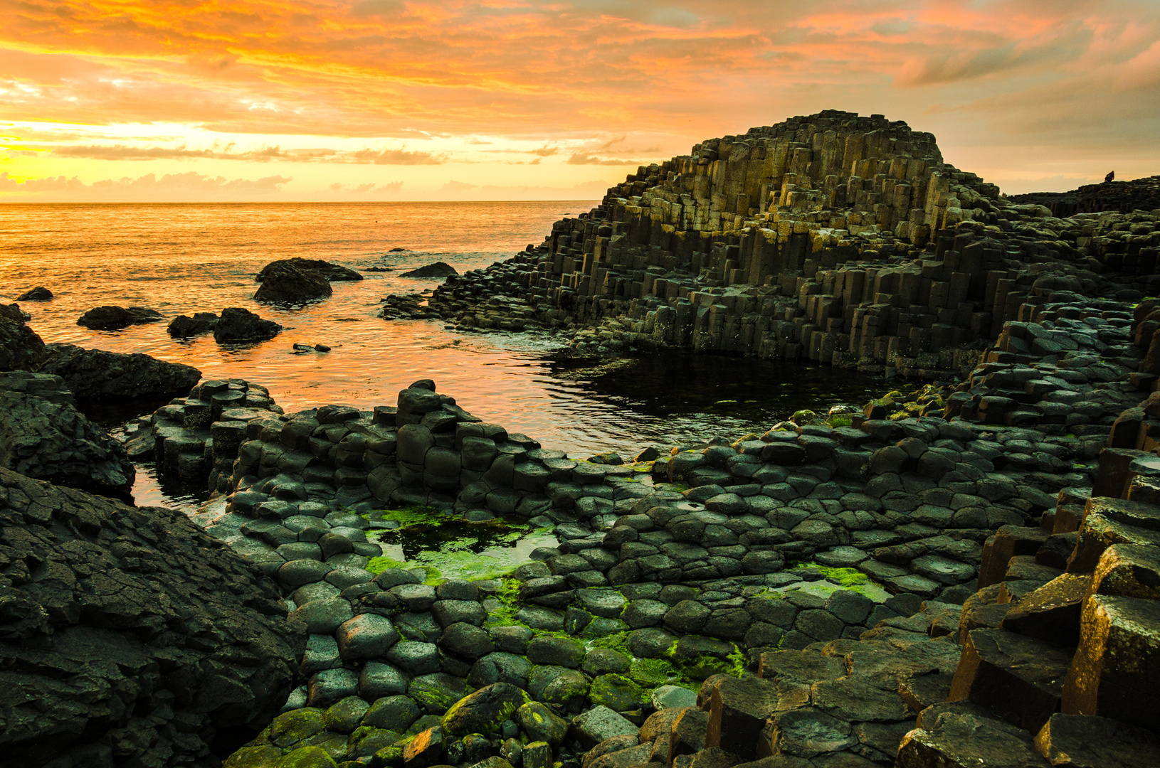 Sleeping Sun at Giant`s Causeway