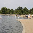 small boats in front of Kensington Palace...