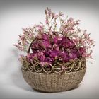 Small floral arrangement in rosé on silverware