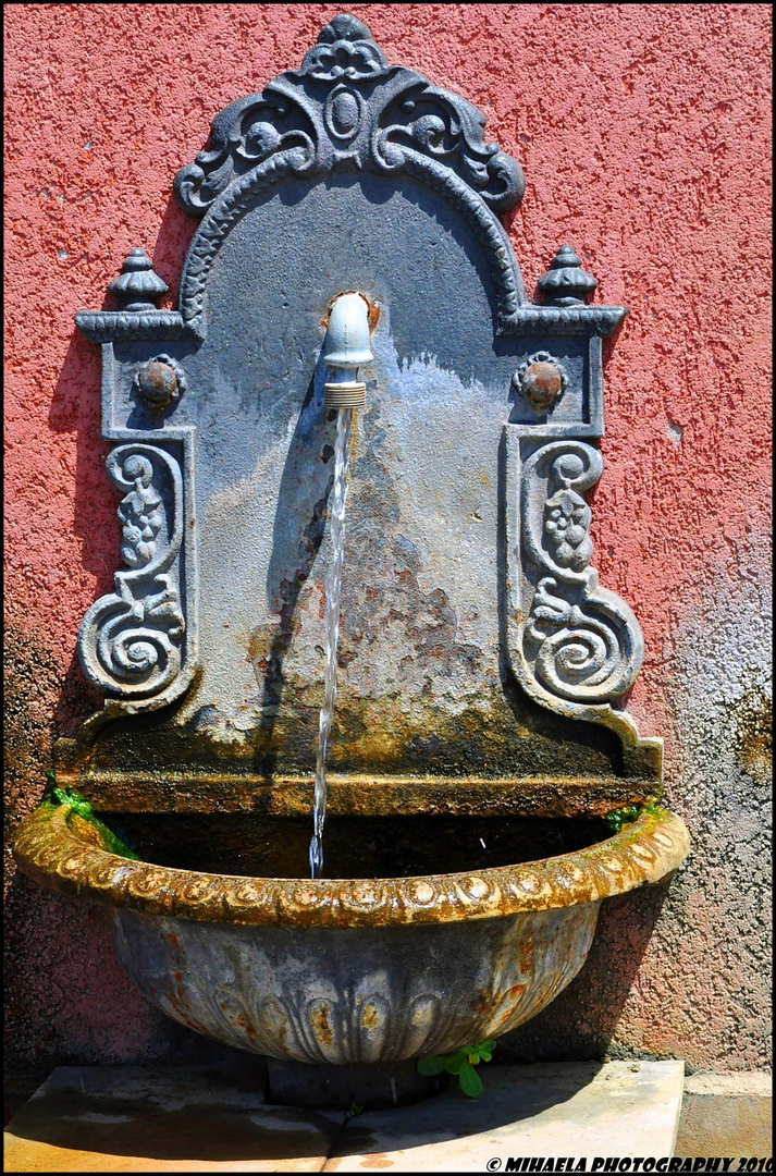 Small fountain in the countryside