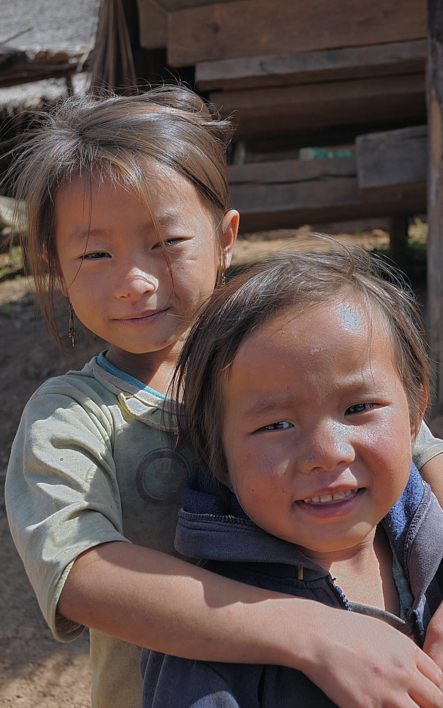 Small Hmong kids looking in the camera