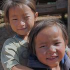 Small Hmong kids looking in the camera