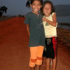 Small Laos girls in Paksé like to be photographed