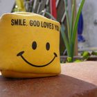 SMILE. GOD LOVES YOU.