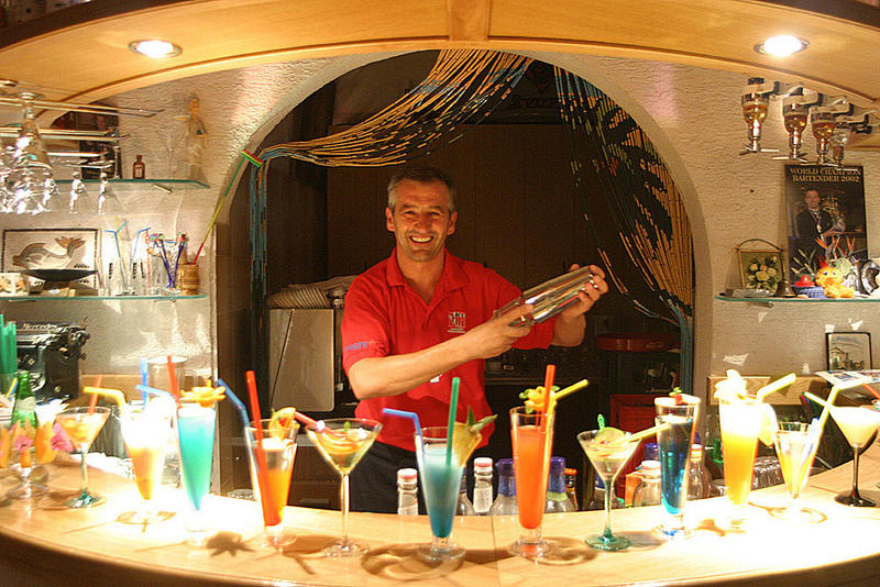 Smile of the Champion of the World 2002 in bar tender