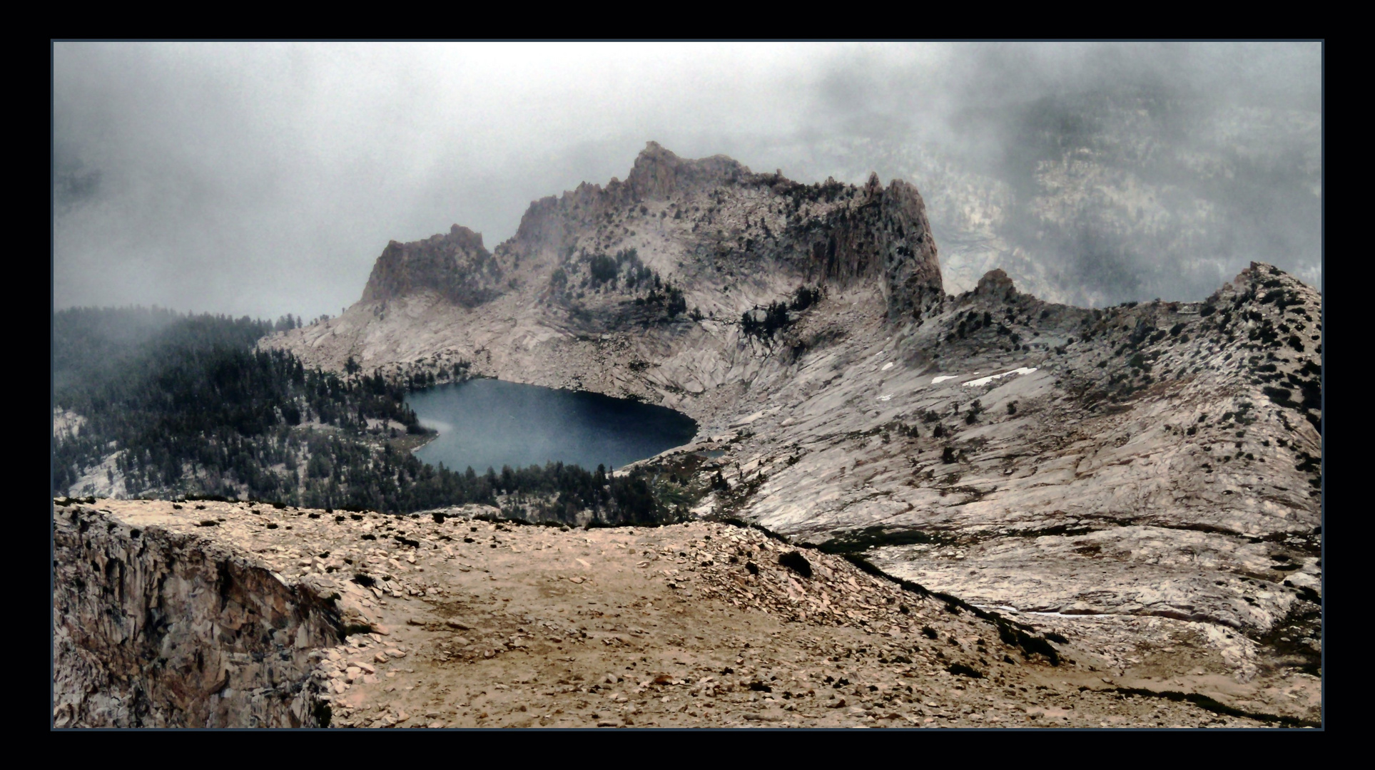 snow clouds descend on Obelisk Lake