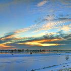 Snowy sunset panorama.